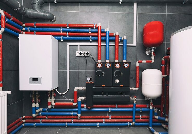 A modern electic boiler room. Equipment for modern heating system as a boiler, heater,pipes, expansion tank and other